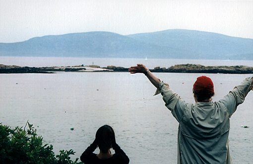 Nancy and Kim waving to RZ on Little Crow Island